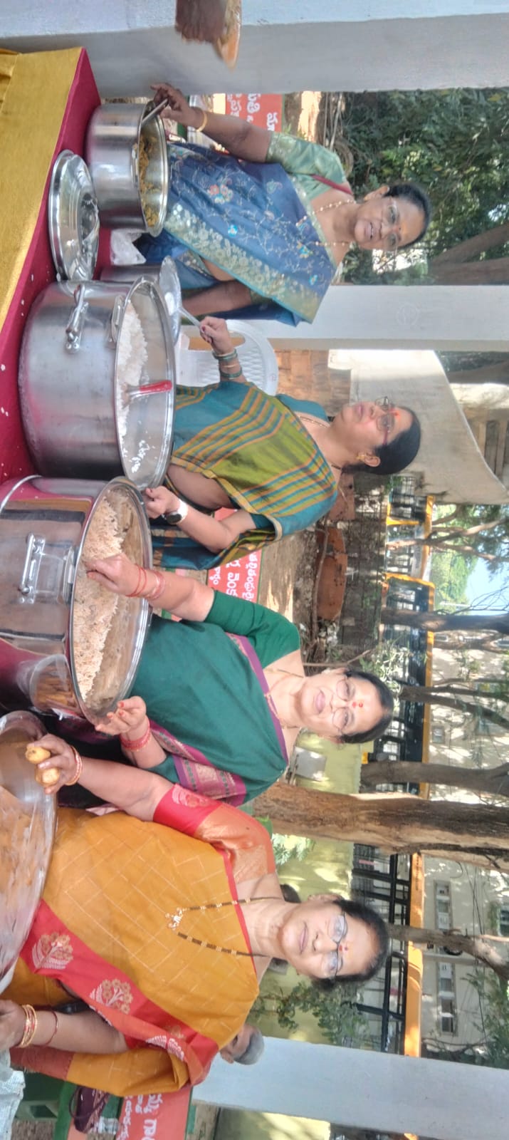 The Women wing team serving food in Karteeka Vana Bhojanaalu.jpg